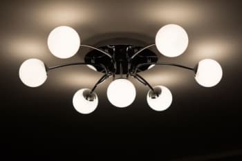 a modern ceiling light with 6 globes